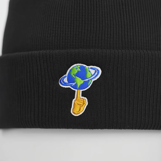 Black beanie with 'World is Yours' text on a white background